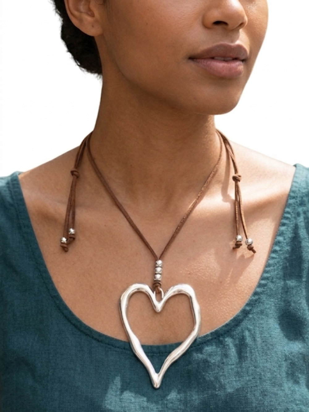 Boho Hammered Silver Heart Necklace | Rustic Cord Pendant
C2